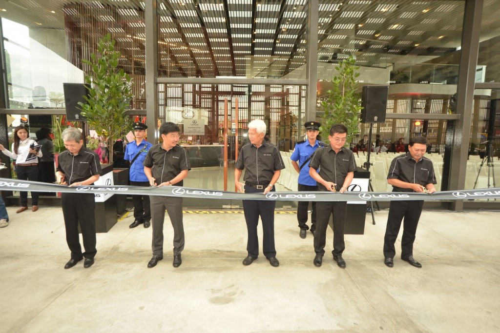 1. Ribbon cuttin ceremony with the management