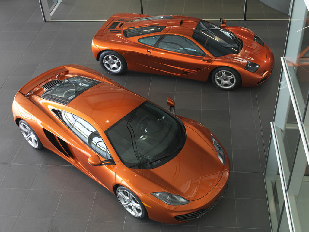 The MP4 12C next to the F1