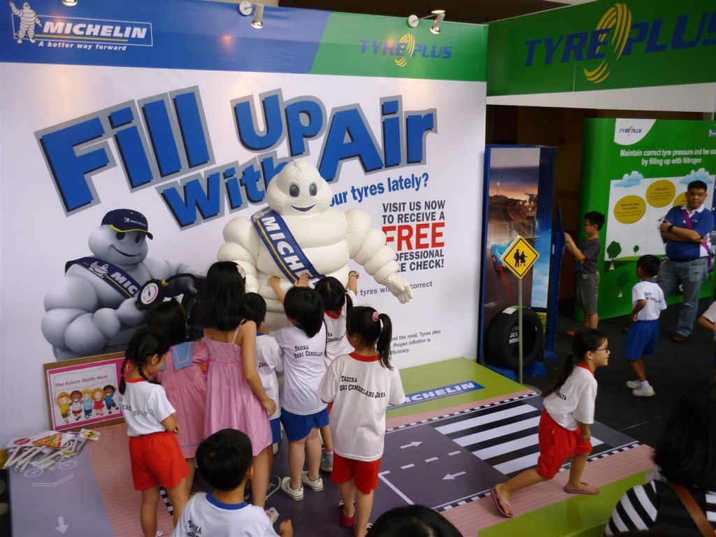 Children greeting the Michelin Man @ FUWA
