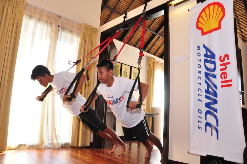 Fakhrusy Rostam and Helmi Azman being tested on their core muscle strength during the camp