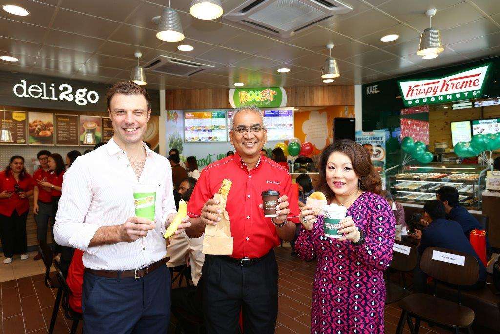 Image 2 - (L to R) - Nick Tiernan Datuk Azman Ismail and Ms Yau Su Peng with some of the food beverage offerings available at the new Shell Select Store