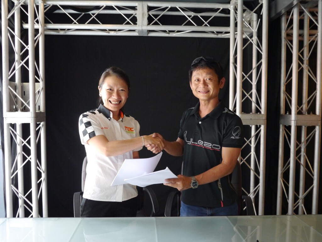 Adelaine Foo, CEO of TOC Automotive College (L) and Zen Low, founder of Aylezo Competizione (R) joining forces to form TOC-Aylezo Race Academy.