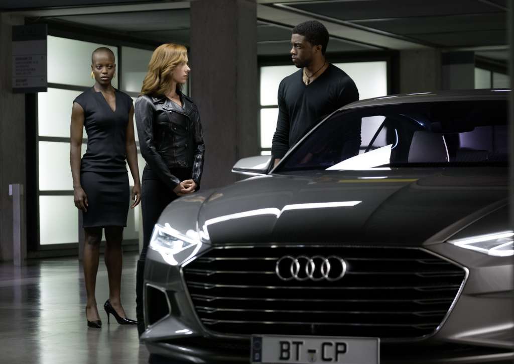 From right: Black Panther/ T’Challa (Chadwick Boseman), Black Widow (Scarlet Johansson) and security chief (Florence Kasumba).