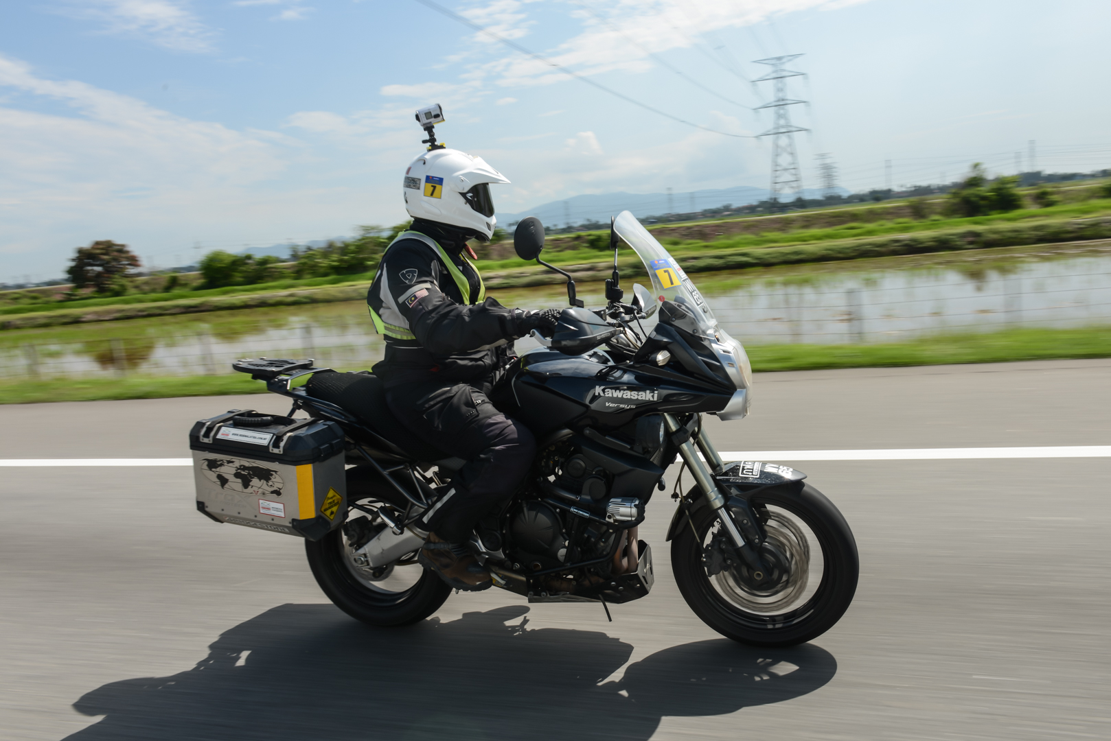 #Advance2Langkawi winner Zahed Abd Rahman riding past padi fields on his Kawasaki Versys 650