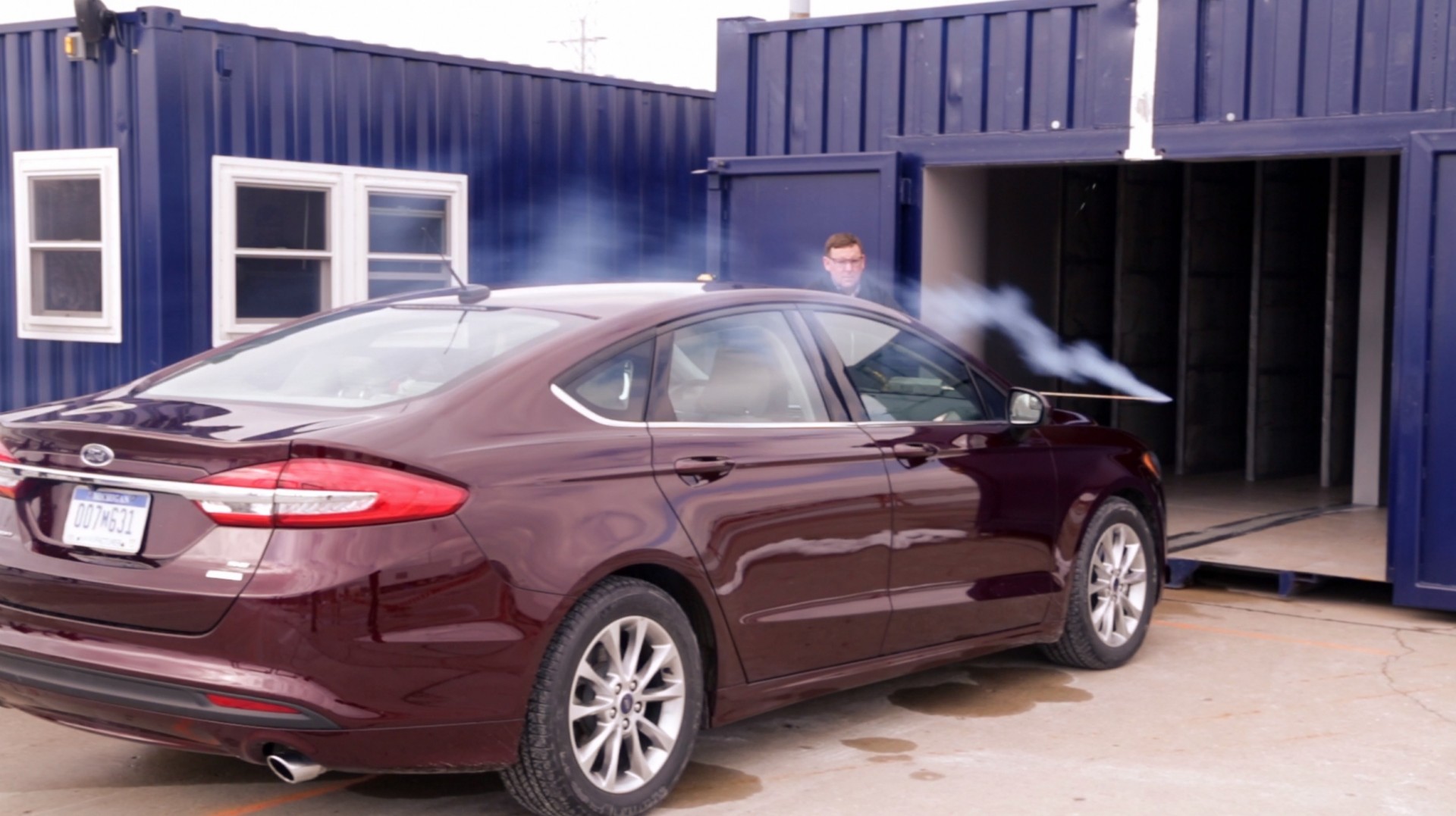 Ford engineers testing wind noise at its portable aeroacostic wind tunnel facility
